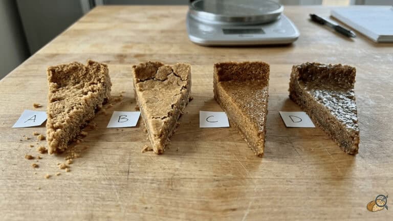 Four graham cracker crust samples at different butter-to-crumb ratios: crumbly to firm to greasy — side-by-side test